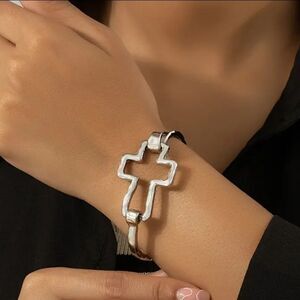 Cross silver tone bracelet